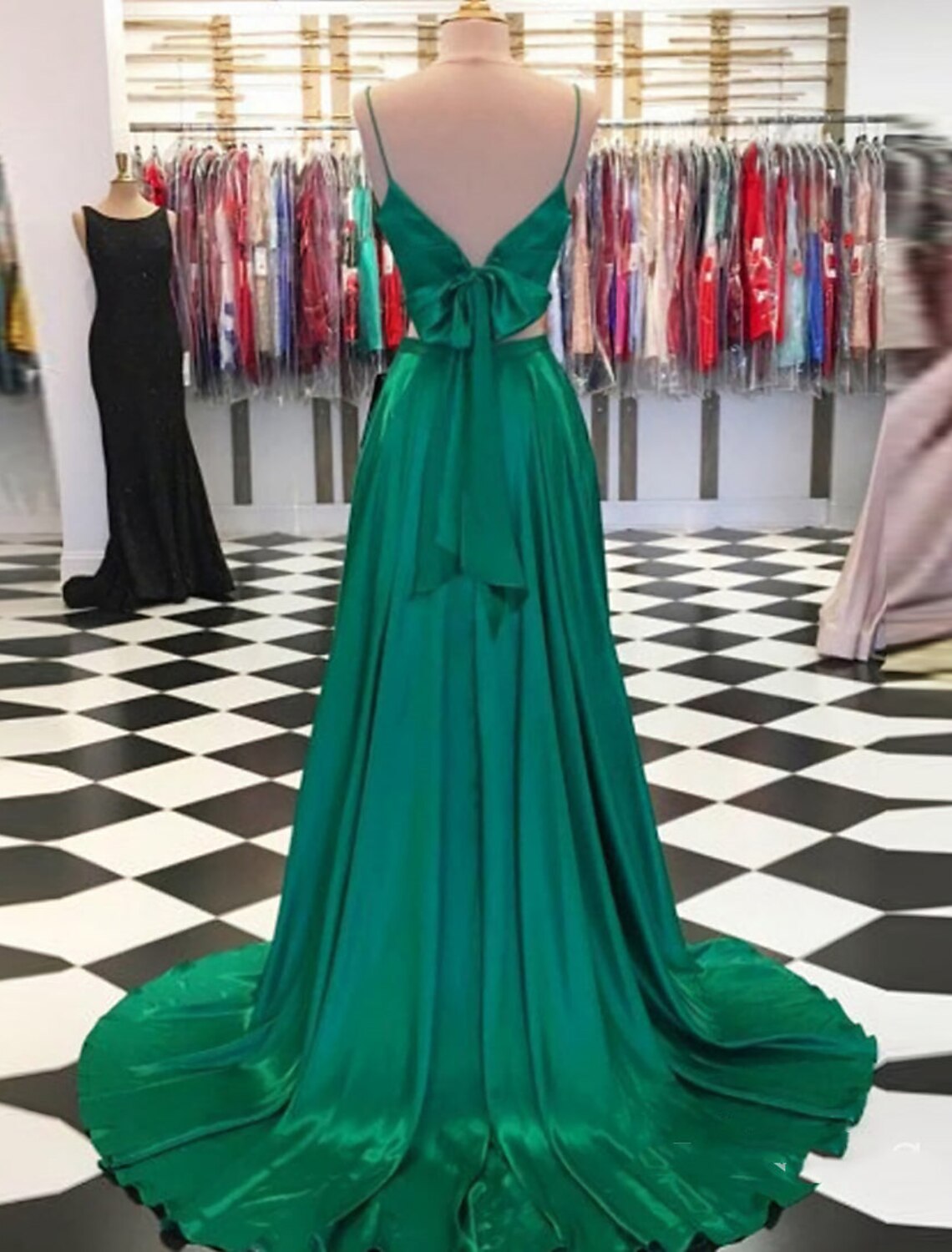 Back view of a two-piece charmeuse formal dress showing the sweep train.