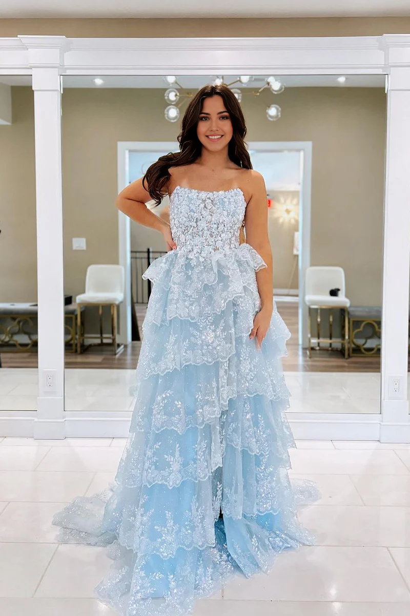 Light blue A-line strapless prom dress with sequin bodice and tulle skirt.