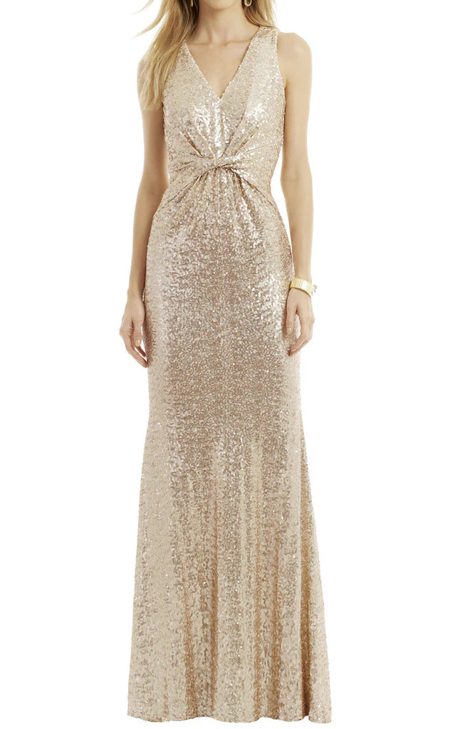 Mermaid sequin formal gown with spaghetti straps.