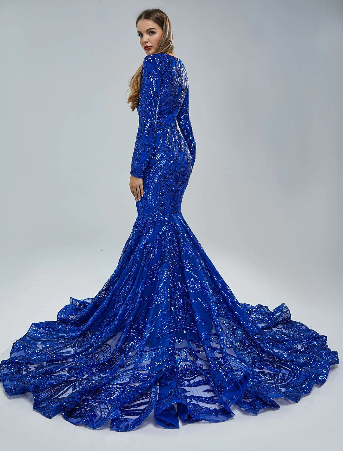 Back view of sequined mermaid trumpet gown showing chapel train.