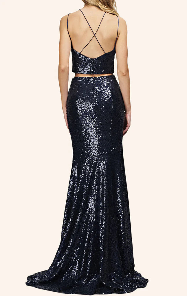 Back view of a woman wearing a shimmering two-piece sequin mermaid V-neck long formal prom gown.