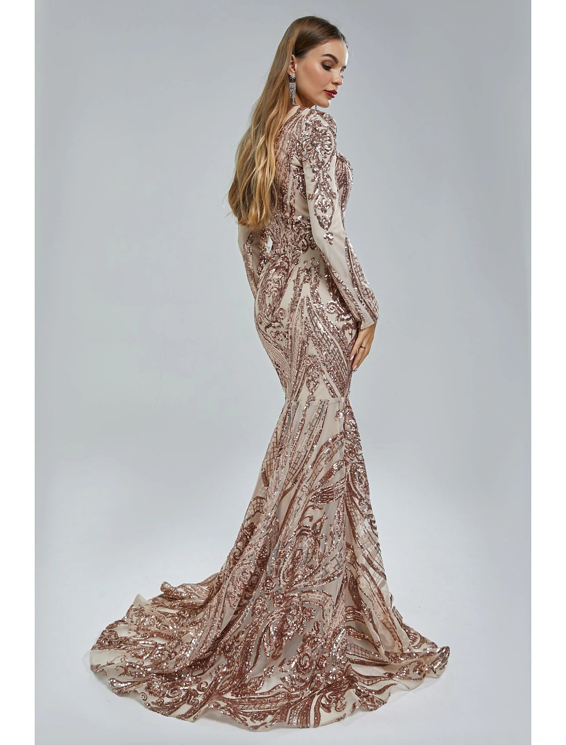 Back view of the elegant mermaid evening gown showing the court train and sequin details.