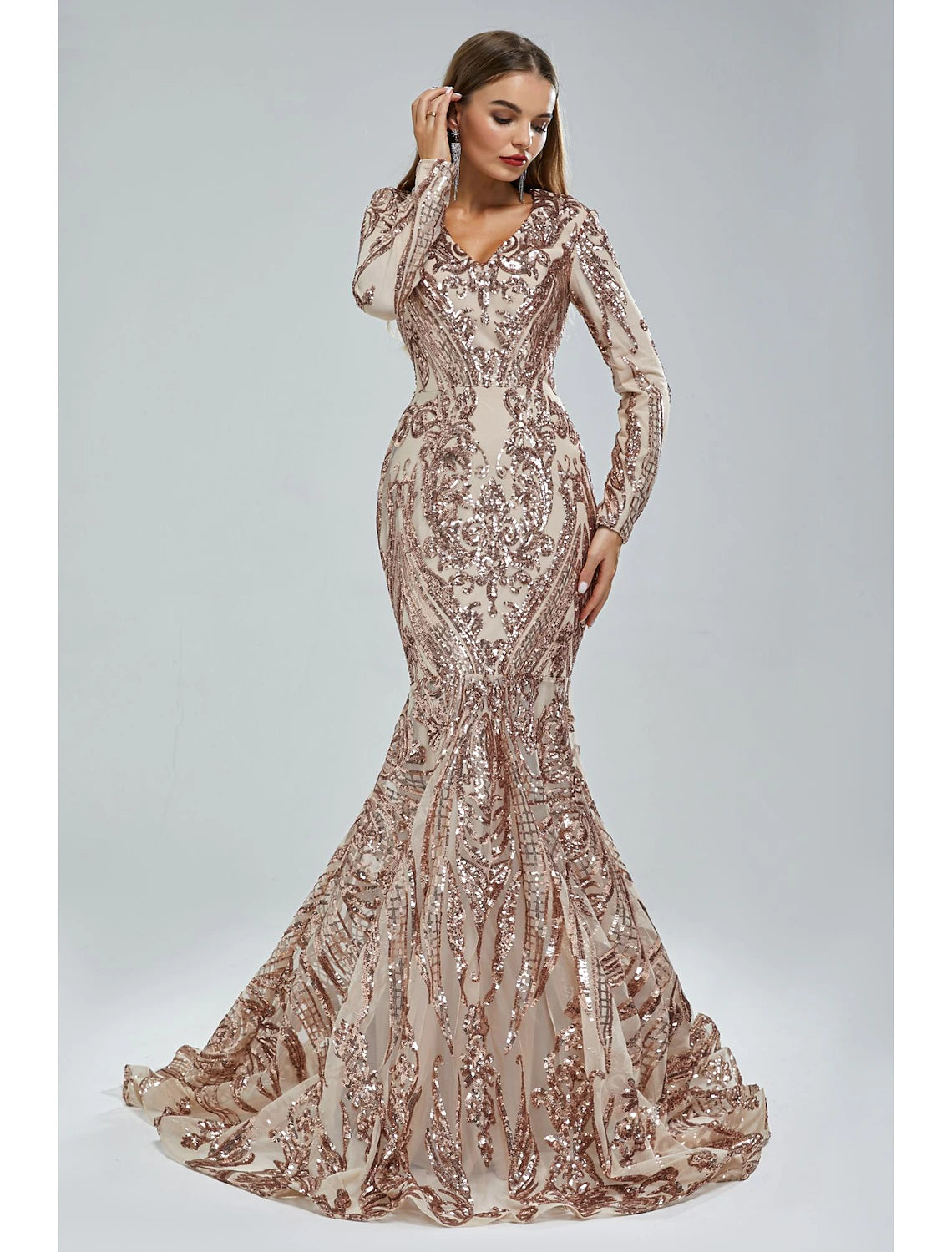 Full length view of the sparkly long sleeve mermaid dress.