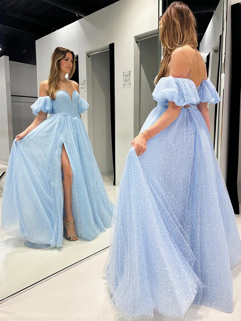 Model posing in a shiny A-line sweetheart off-shoulder long tulle prom dress.