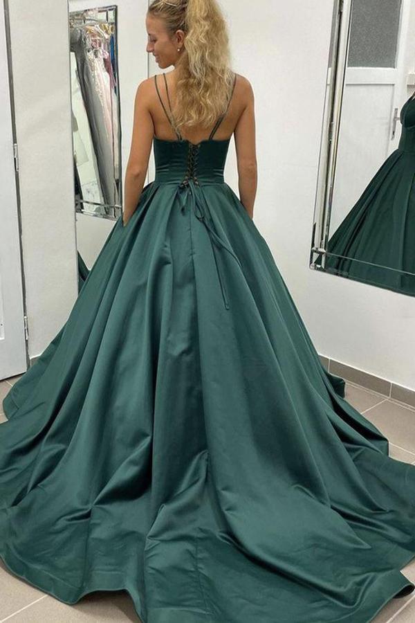 Side view of a simple satin formal dress with A-line silhouette and V-neck.