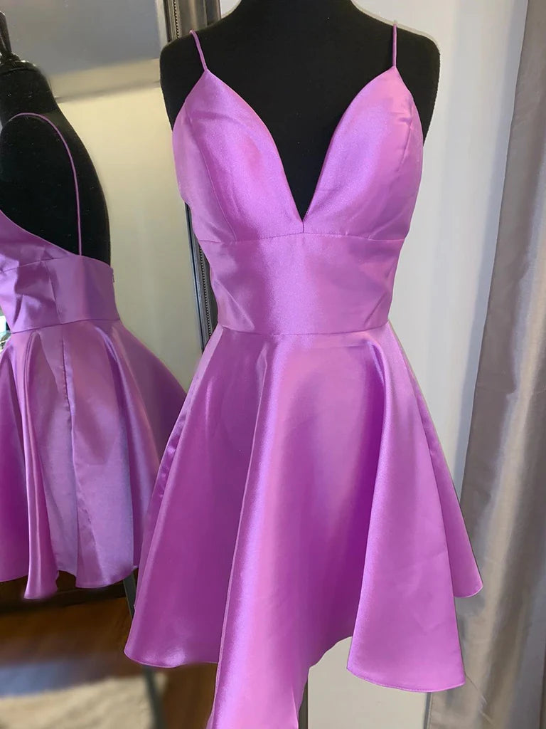 Model wearing a short A-line V-neck prom or homecoming dress.