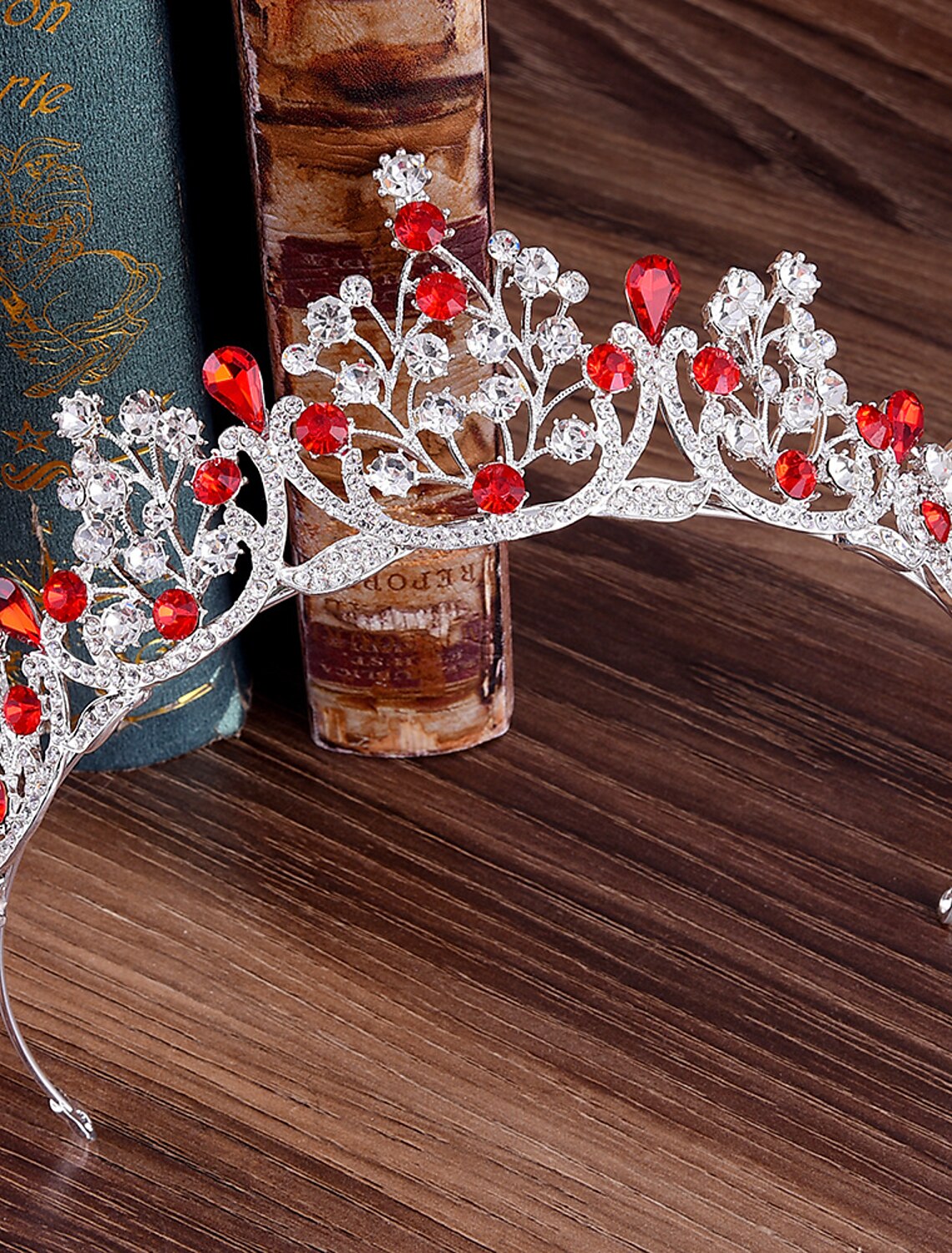 Simple metal bridal crown tiara on a white background.