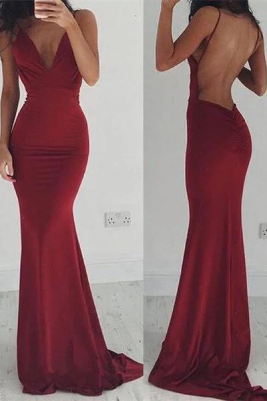 Elegant backless maxi prom dress with spaghetti straps.