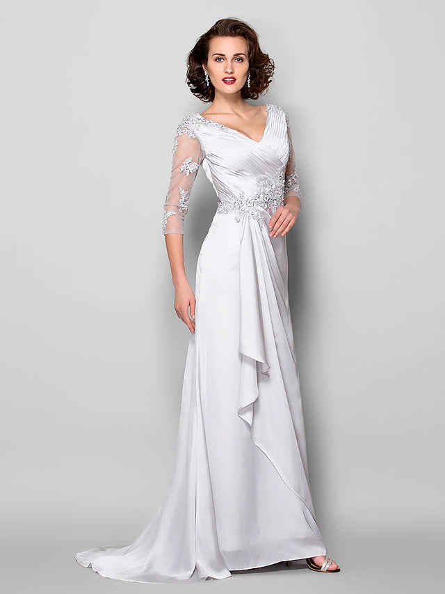 Back view of the elegant V-neck gown with criss-cross beading.
