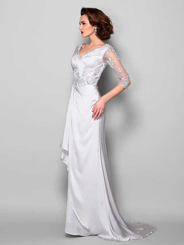 Close-up of the delicate beading and appliques on the dress bodice.