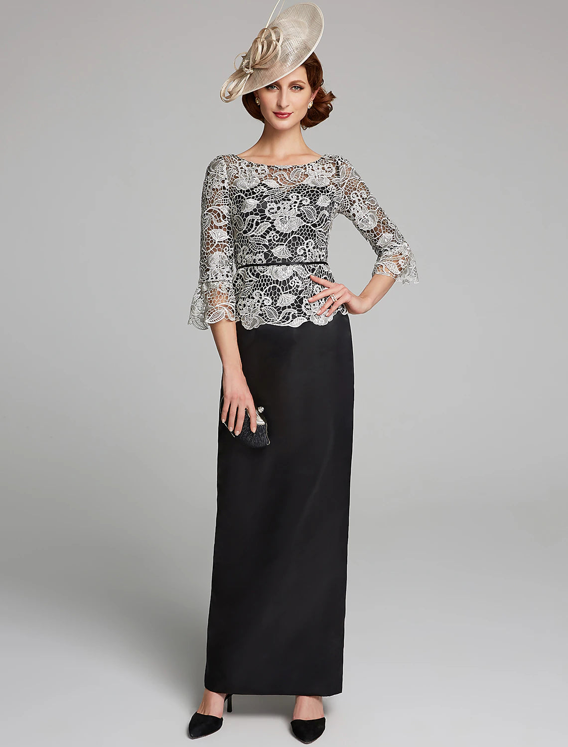Elegant dark blue sheath mother of the bride dress with jewel neck and 3/4 lace sleeves.