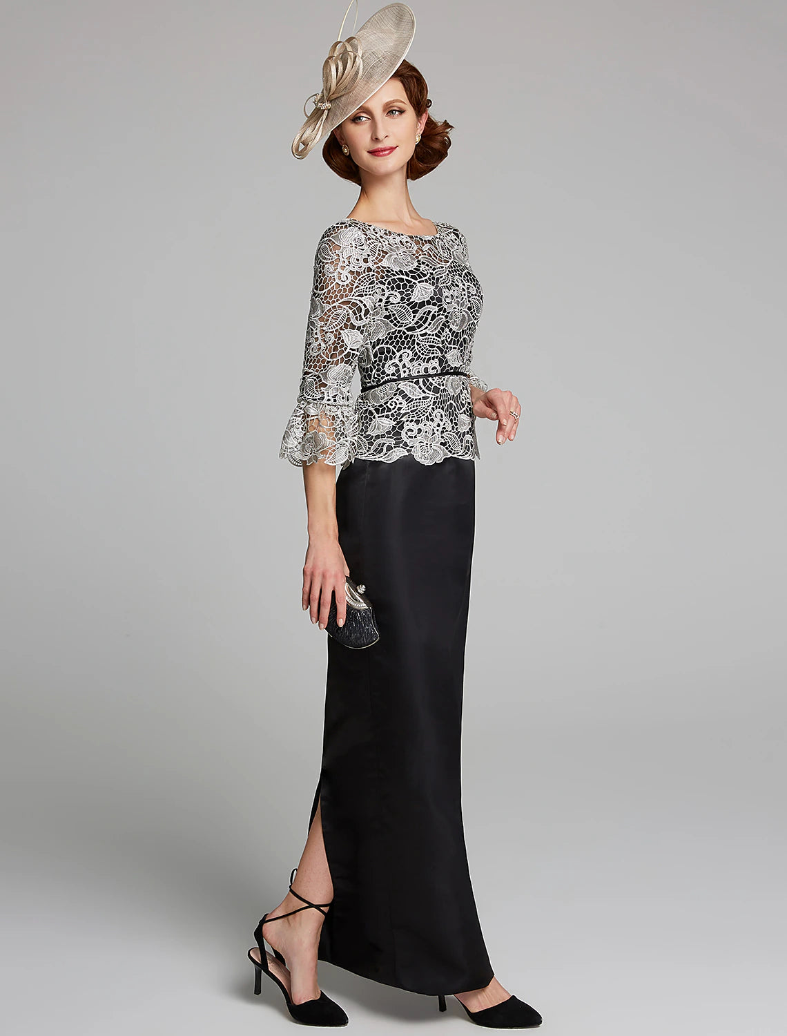 Back view of the dark blue sheath gown, showcasing the smooth satin fabric.
