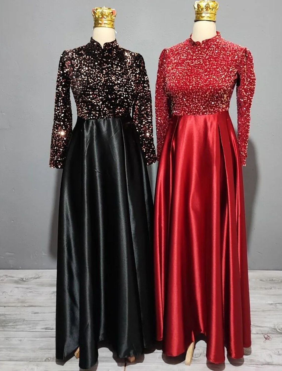 Side view of a model in a red sequin satin A-line gown.