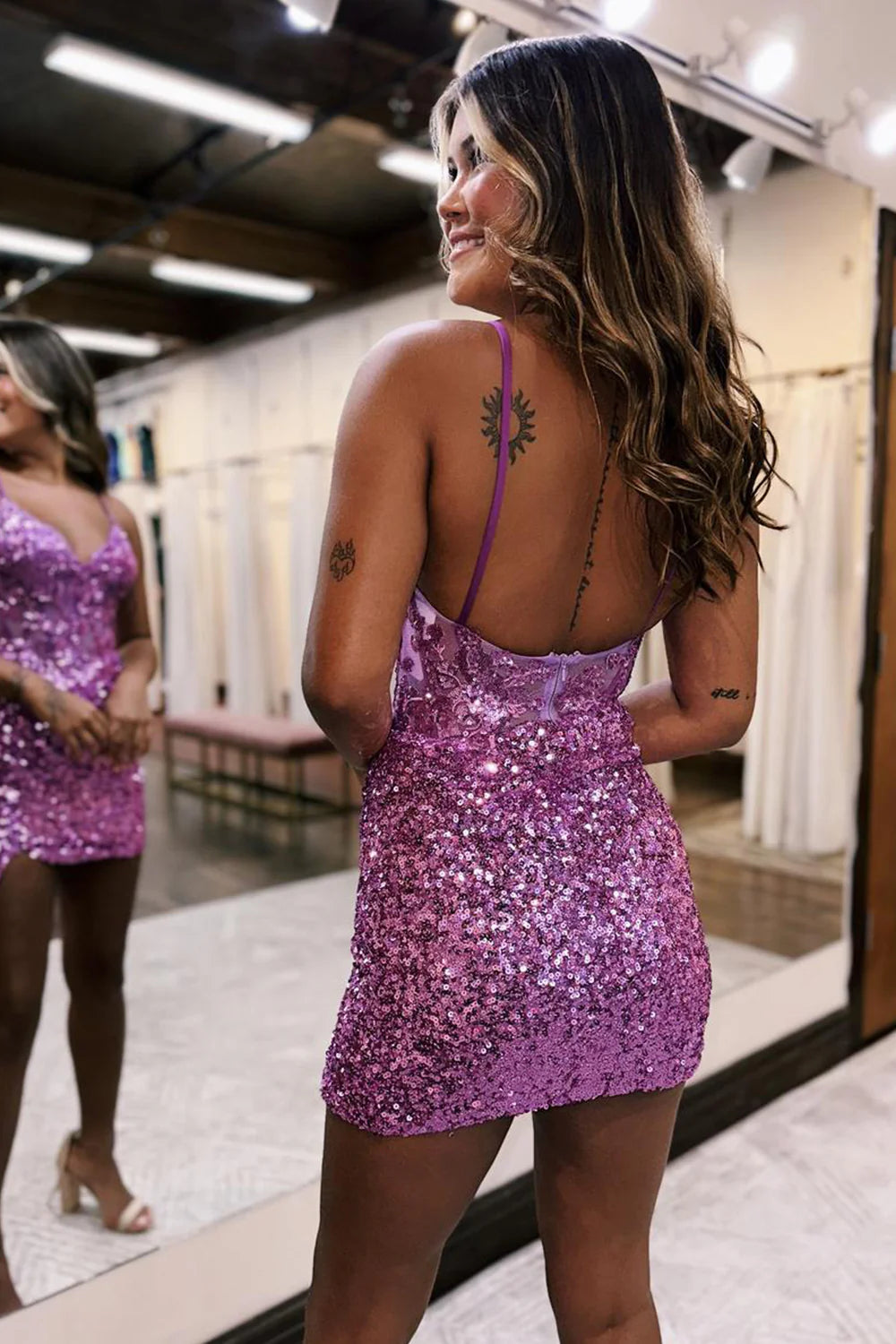 Side profile of the glitter bodycon spaghetti strap dress.