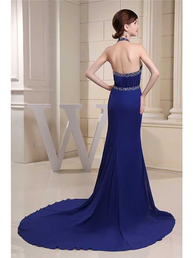 Detail of the sparkling fabric and beading on the evening gown.