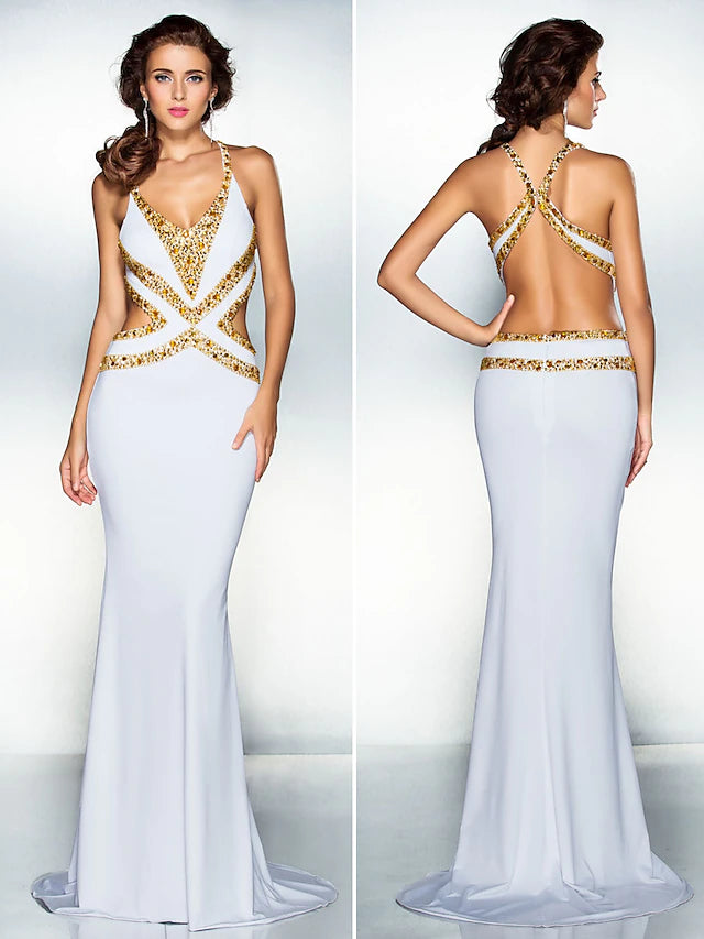 Sparkle mermaid gown with V-neckline and sweep train.