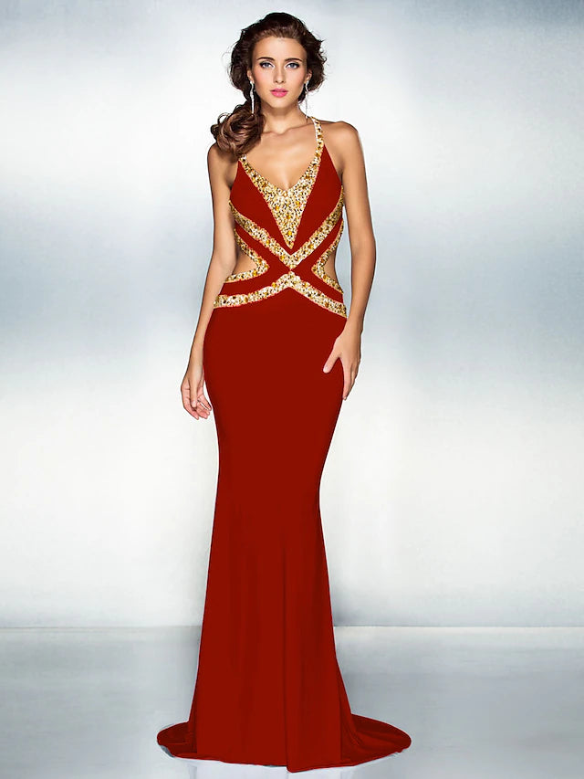 Back view of the sparkle gown showing crisscross straps and crystal details.