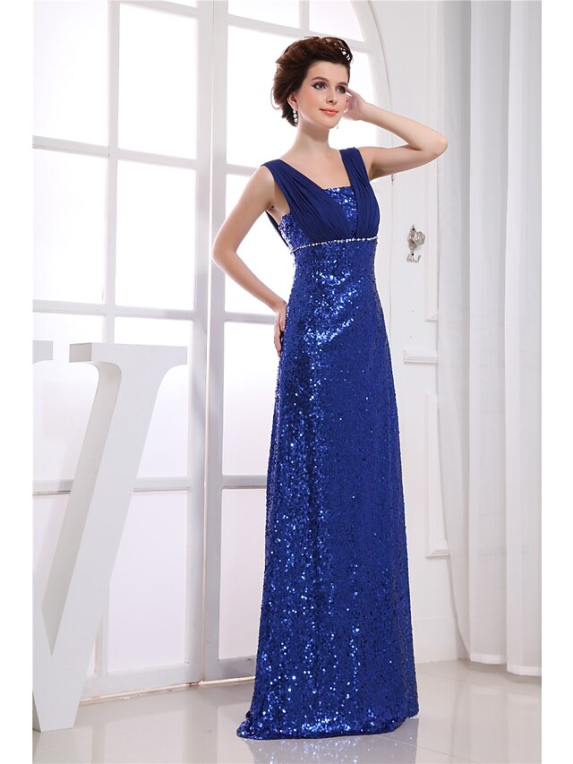 Back view of a floor-length chiffon dress with subtle beading.