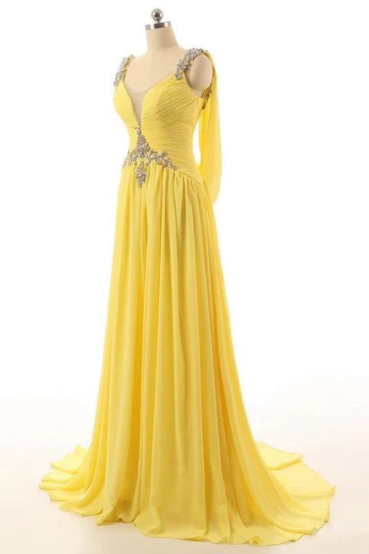 Full length view of the sparkling A-line sleeveless gown.