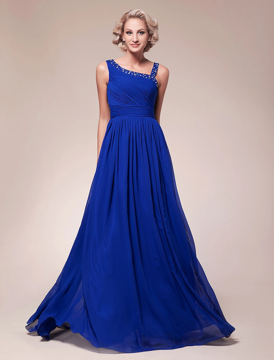 Elegant A-line Mother of the Bride dress with sparkling straps and pleated chiffon skirt.