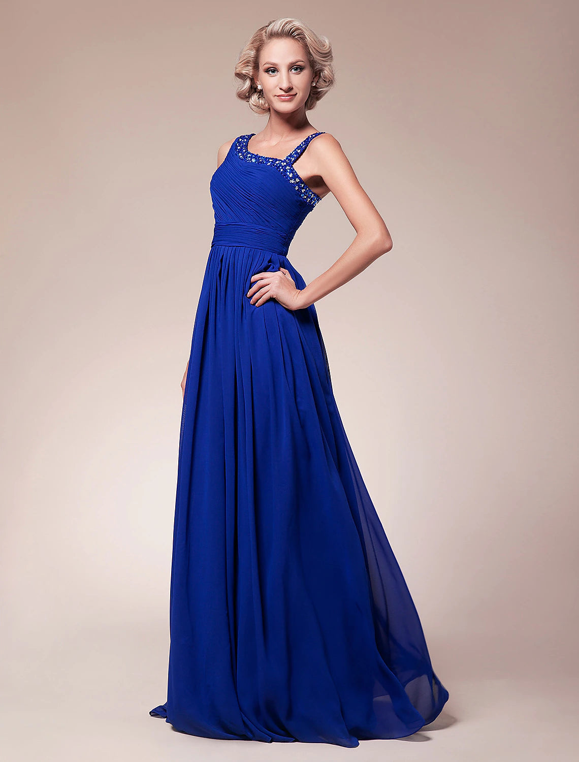 Side profile of the floor-length A-line Mother of the Bride dress, showcasing its silhouette.