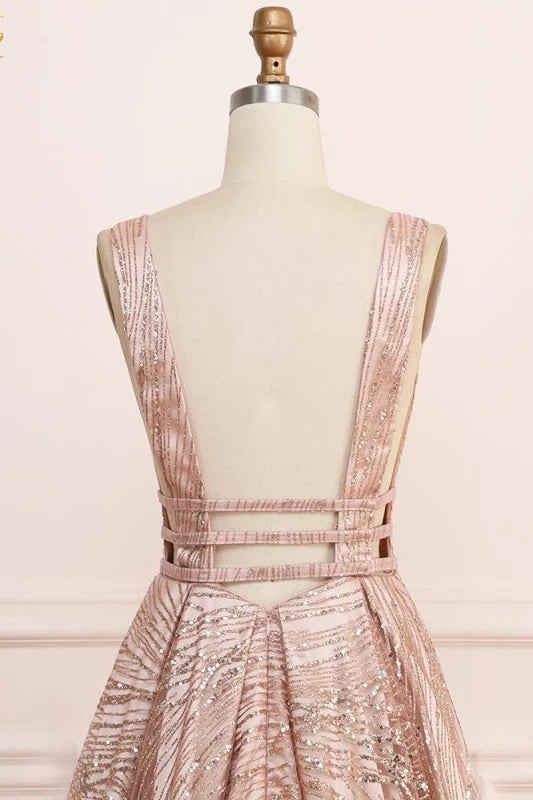 Close-up of the deep V-neckline and sequin glitter detail on the prom dress.