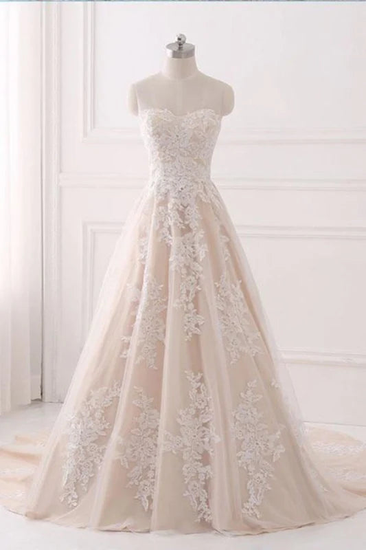 Sleeveless deep V-neck formal gown with sequin and tulle details.