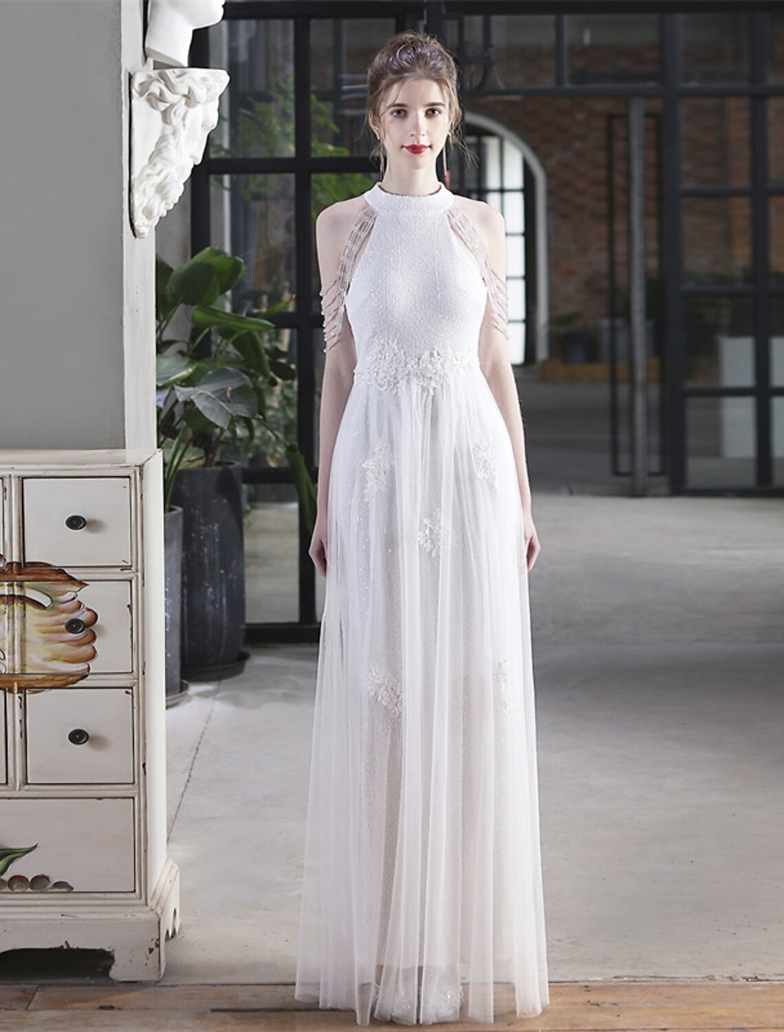 A-line prom dress with high neck and short sleeves, adorned with sparkling sequins.