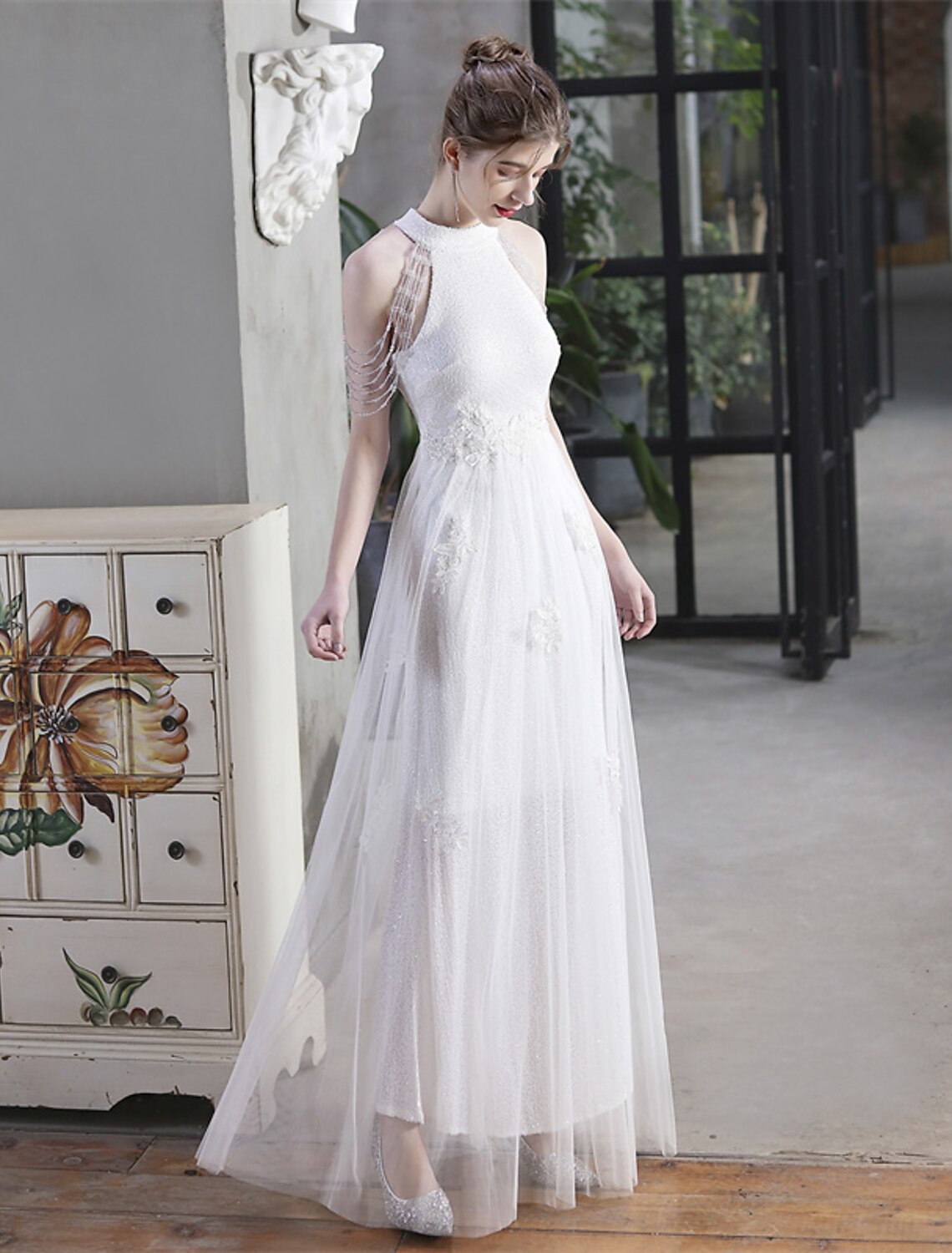 Elegant A-line prom dress with shimmering sequin details.