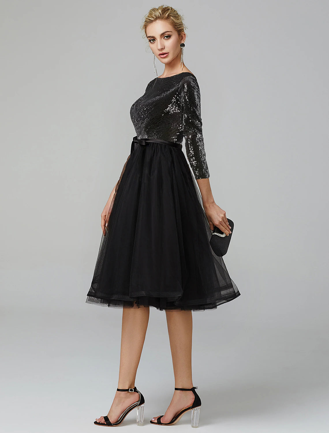 Close-up of the sequin and tulle fabric on the formal dress.