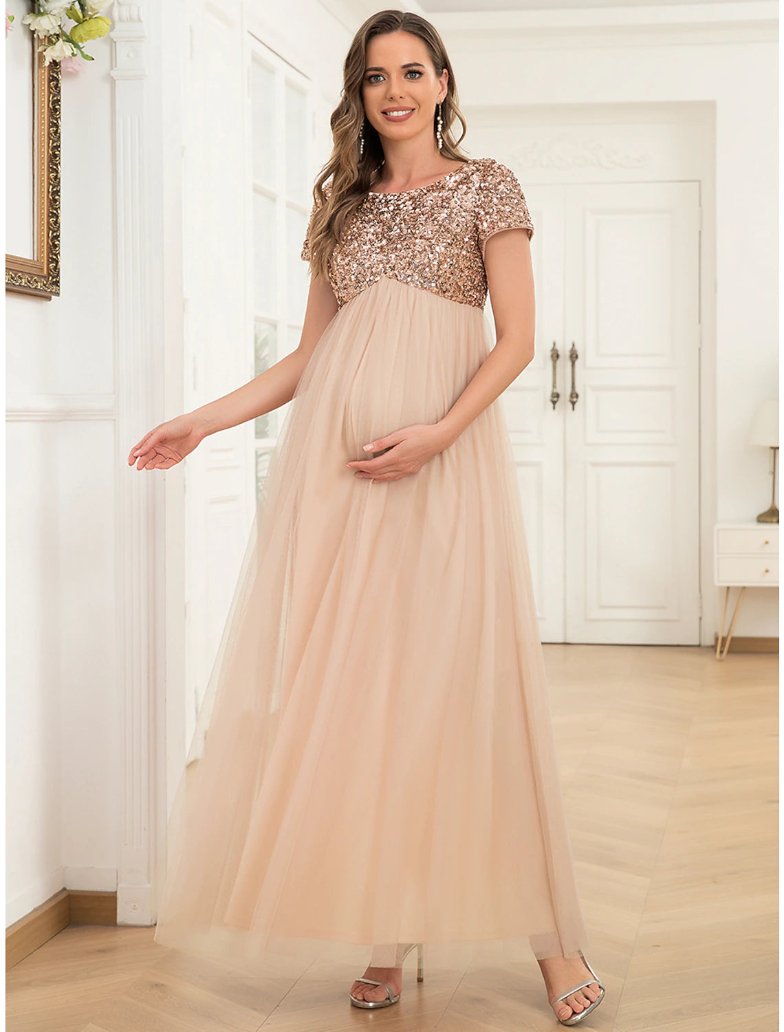 Close-up of the sequin tulle fabric on the A-line maternity dress.