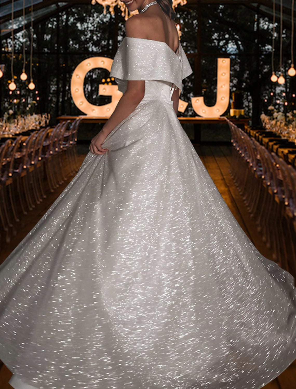 Close-up of sequin details on the cap sleeve wedding dress.
