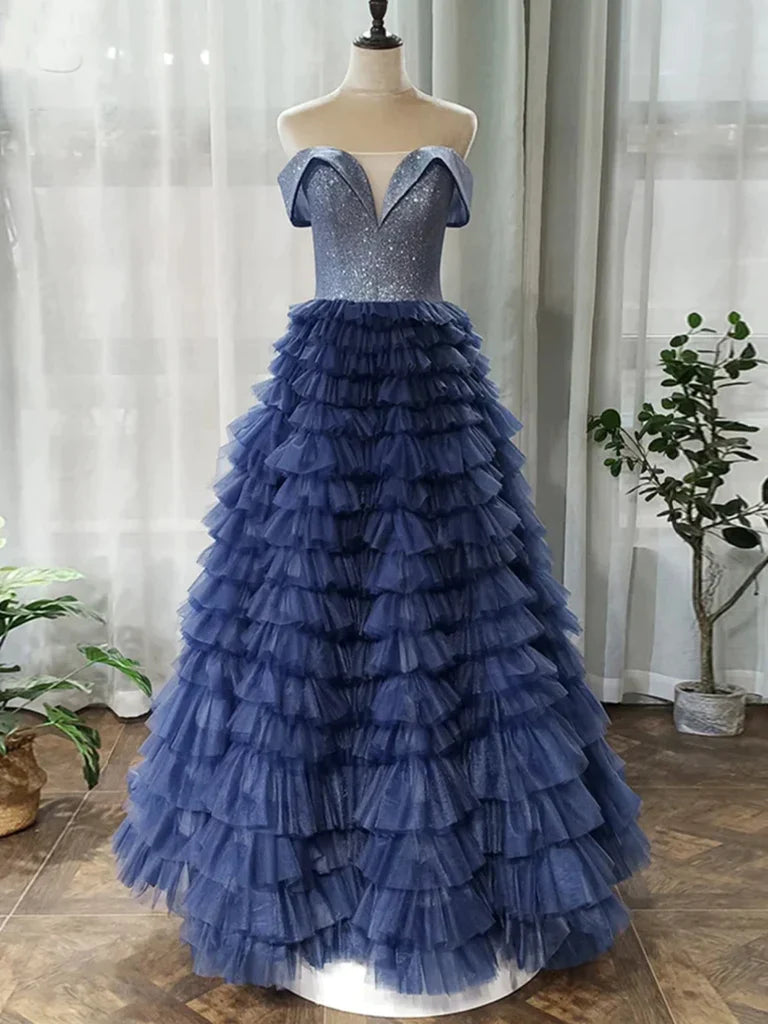 Model wearing a sparkling off-shoulder sequin A-line long prom dress.