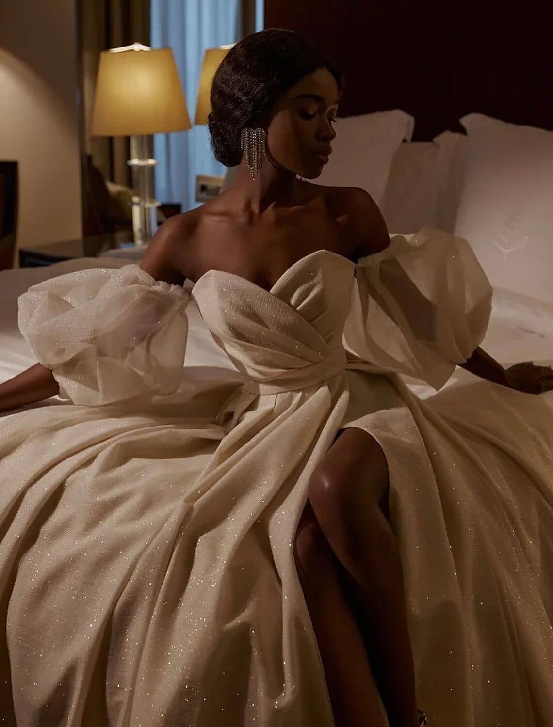 Detail of the split front on the elegant bridal gown.