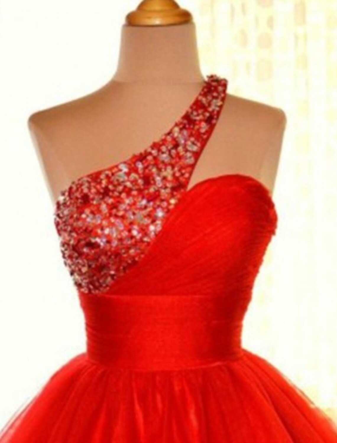 Back view of the pink A-line one-shoulder mini sequin dress.