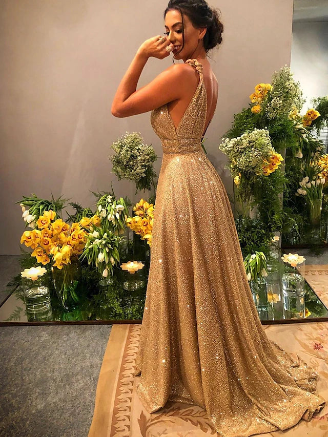 Back view of the A-line prom dress, highlighting the elegant backless design and delicate spaghetti straps.