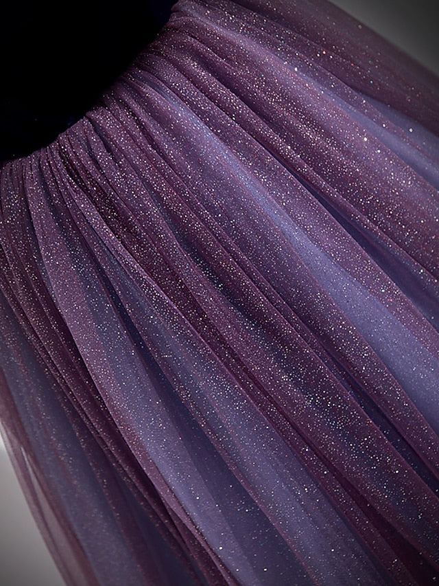 Side view of the sparkling A-line prom dress.