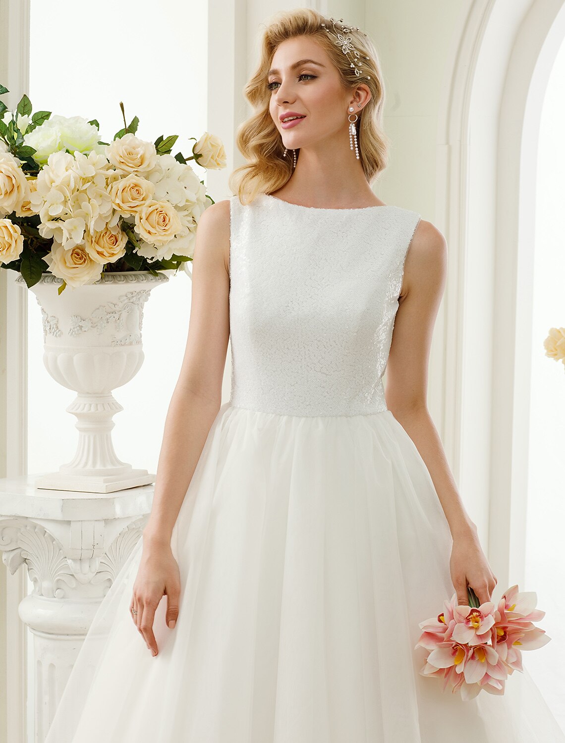Detail of scoop neck on A-line wedding dress.