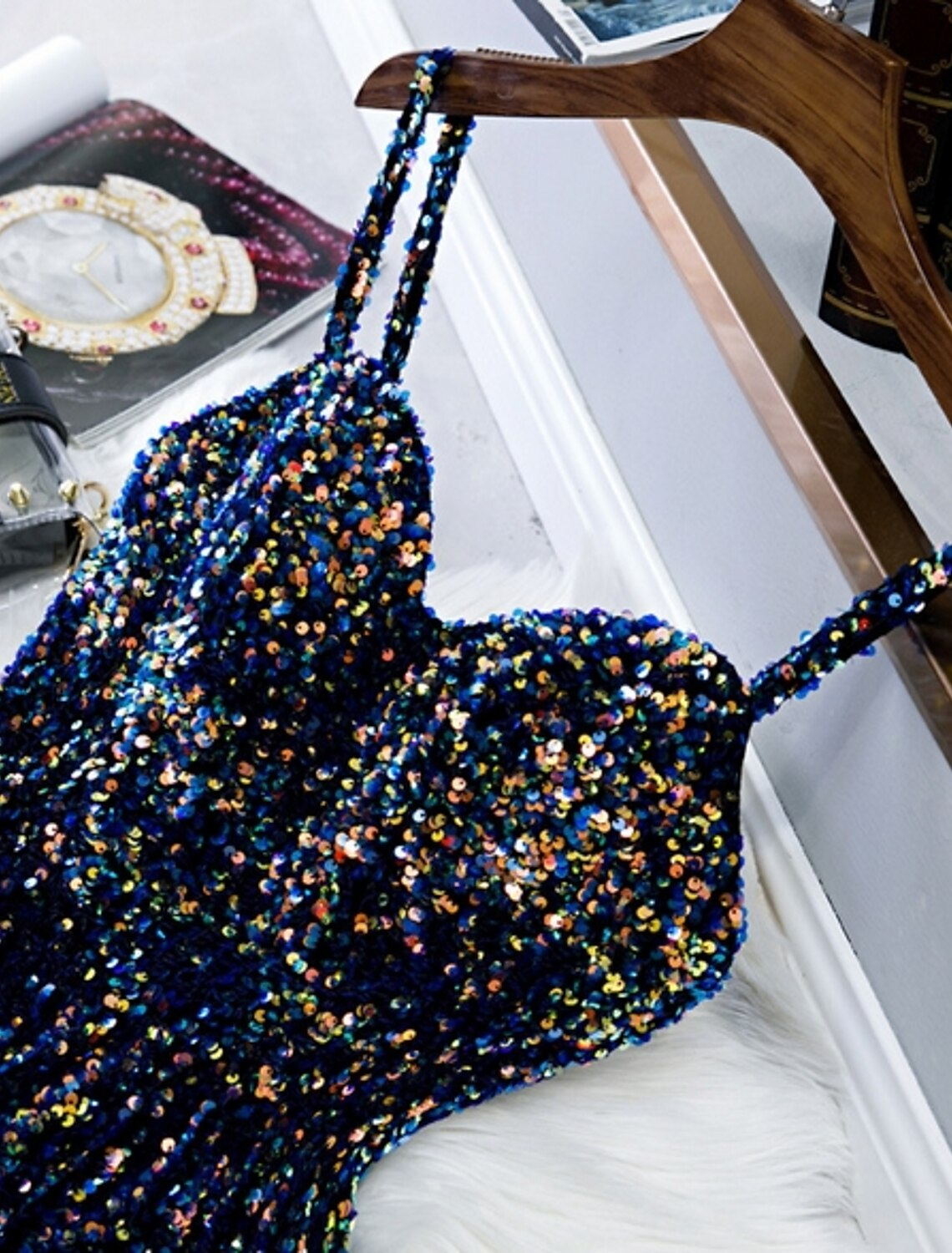 Close-up of the sequin detail on the knee-length A-line party dress.