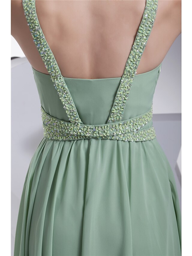 Side view of the elegant A-line chiffon dress, showcasing its flowing silhouette.