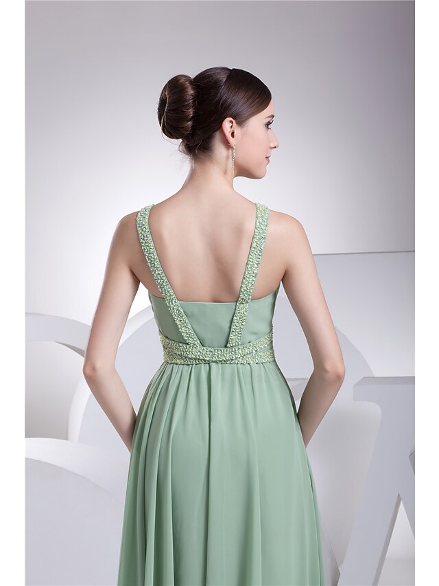 Full length view of the sparkling A-line formal dress.