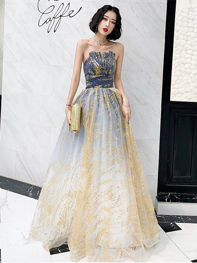 Model wearing a sparkling A-line color block strapless sequin floor-length prom dress.