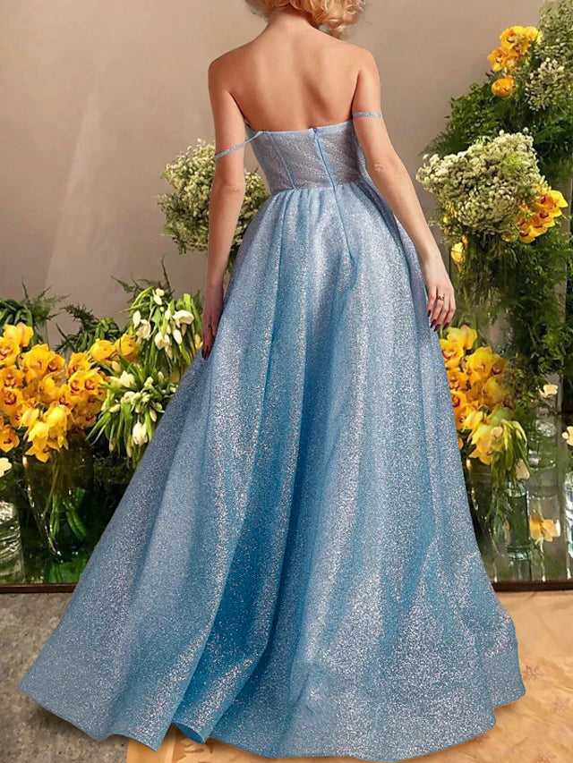 Back view of a shimmering A-line prom dress with a sweetheart neckline.