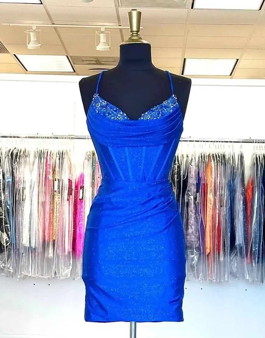 Royal blue glitter short party dress with spaghetti straps.