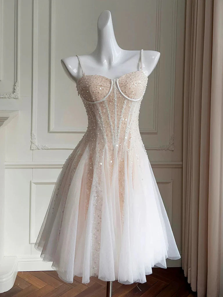 Full view of the A-line sequin short tulle dress with sweetheart neckline.