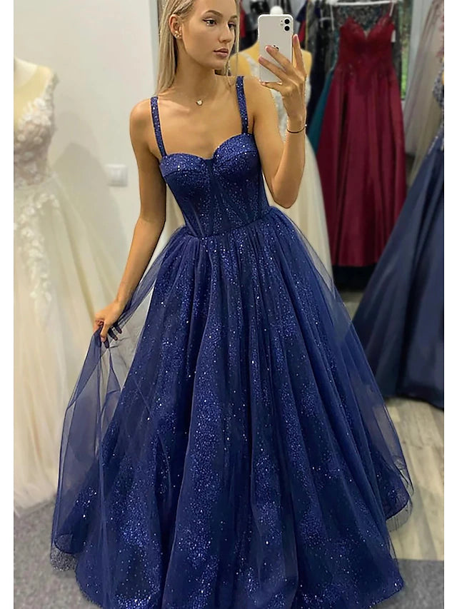 Sparkling A-line sweetheart prom dress with glitter pleats and a floor-length tulle skirt.