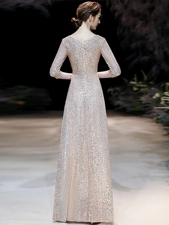 Detail of the 3/4 length sleeve and sequin embellishments on the A-line prom dress.