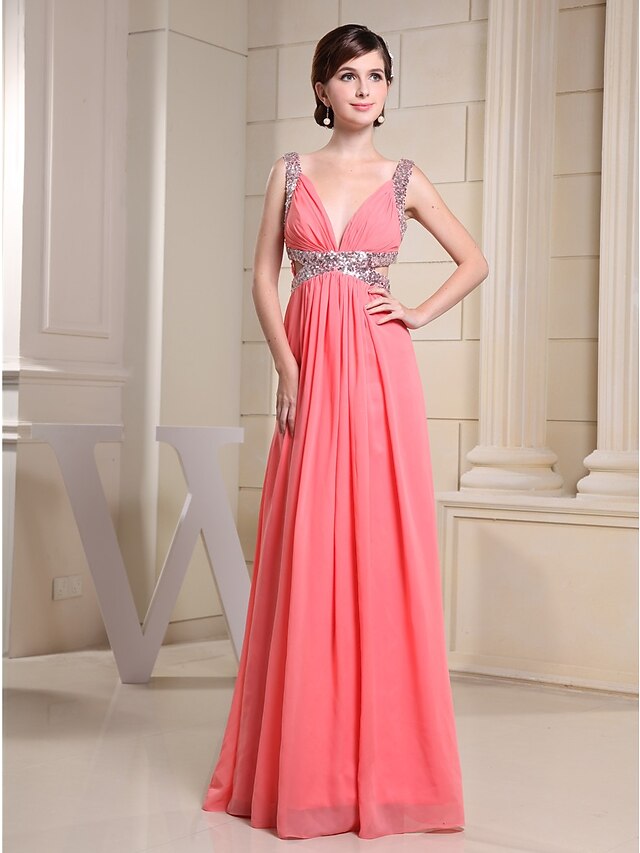Model wearing a sparkling A-line V-neck sequin chiffon evening gown.