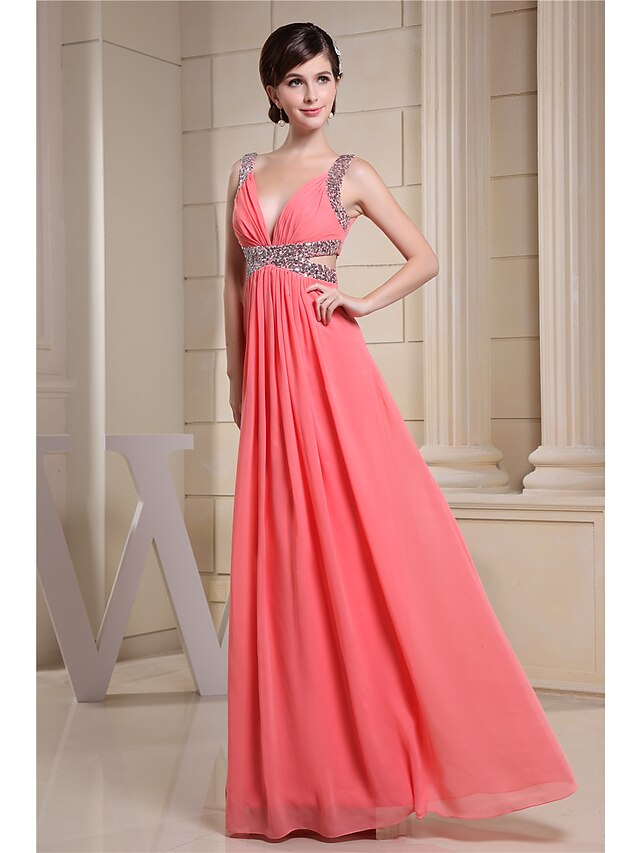 Close-up of the V-neckline and sequin details on the chiffon gown.