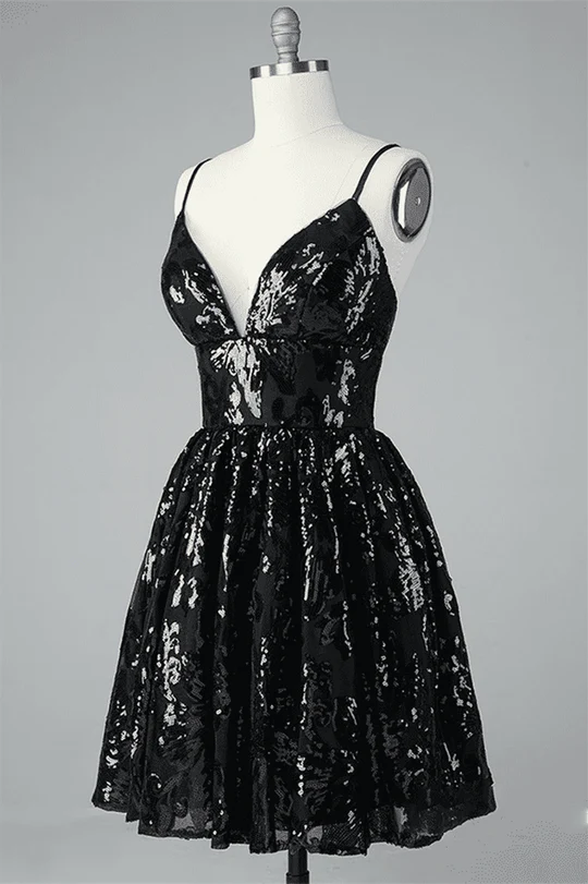 Back view of an A-line V-neck sequin mini dress, highlighting the lace-up detail.